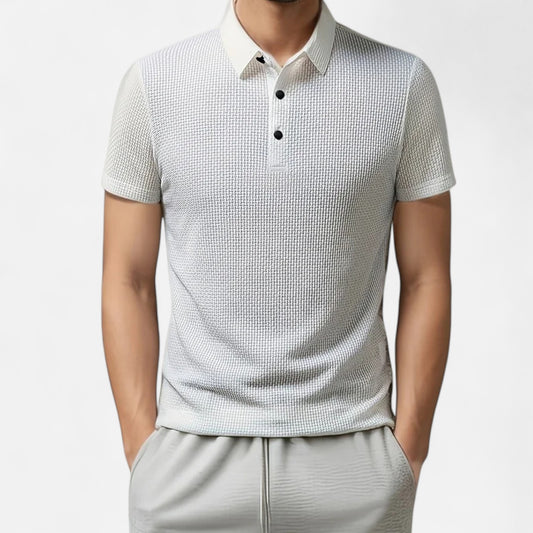 Velour Mode | Polo Femme Manches Courtes à Motif Floral Osseux – Élégance Sportive Monochrome